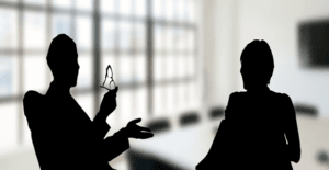 lexsense_sihlouette-man-and-woman-sitting-side-to-side